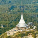 2019:_Close_up_aerial_view_of_Jested_tower_transmitter_near_Liberec_in_Czechia.