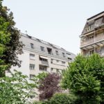 Blick auf Fassade eines aufgestockten Mehrfamilienhauses in Lausanne